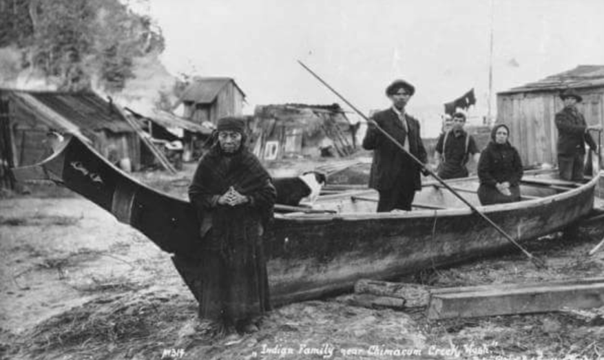 The Hicks family posing with canoe near Chimacum Creek, Washington, ca. 1914